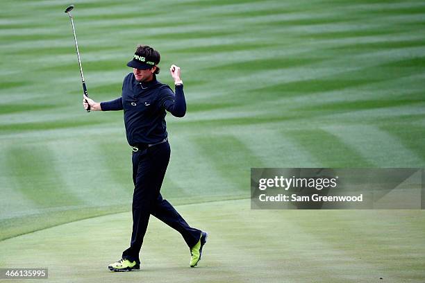 Bubba Watson reacts to making a birdie on the 8th hole during the second round of the Waste Management Phoenix Open at TPC Scottsdale on January 31,...