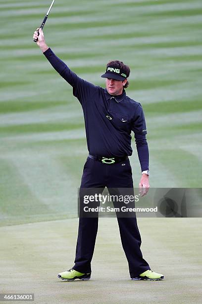 Bubba Watson reacts to making a birdie on the 8th hole during the second round of the Waste Management Phoenix Open at TPC Scottsdale on January 31,...