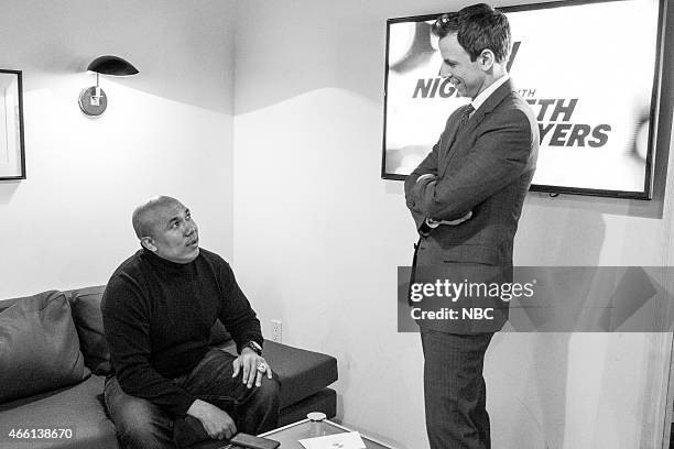 Episode 0155 -- Pictured: NBC sports analyst Hines Ward talks with host Seth Meyers backstage on January 22, 2015 --