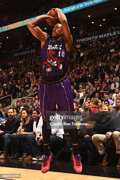 March 13 : DeMar DeRozan of the Toronto Raptors takes a shot against the Miami Heat on March 13, 2015 at the Air Canada Centre in Toronto, Ontario,...