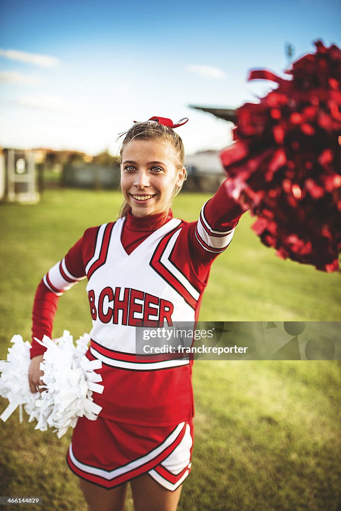 Happiness Cheerleader Posing With Ponpon High-Res Stock Photo - Getty Images