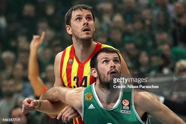 Antonis Fotsis, #9 of Panathinaikos Athens competes with Bostjan Nachbar, #34 of FC Barcelona during the 2013-2014 Turkish Airlines Euroleague Top 16...