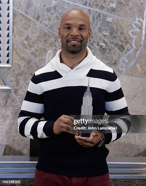 Matt Forte of the Chicago Bears lights The Empire State Building on January 31, 2014 in New York City.