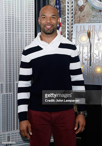 Matt Forte of the Chicago Bears lights The Empire State Building on January 31, 2014 in New York City.