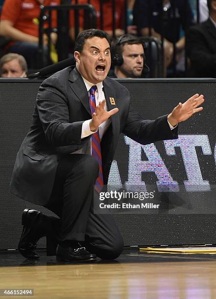 Head coach Sean Miller of the Arizona Wildcats yells to his players during a semifinal game of the Pac-12 Basketball Tournament against the UCLA...