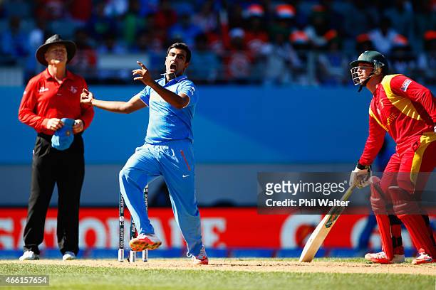 Ravichandran Ashwin of India catches out Sean Williams of Zimbabwe during the 2015 ICC Cricket World Cup match between India and Zimbabwe at Eden...