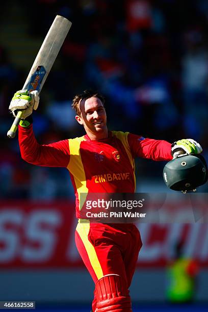 Brendan Taylor of Zimbabwe celebrates his century during the 2015 ICC Cricket World Cup match between India and Zimbabwe at Eden Park on March 14,...