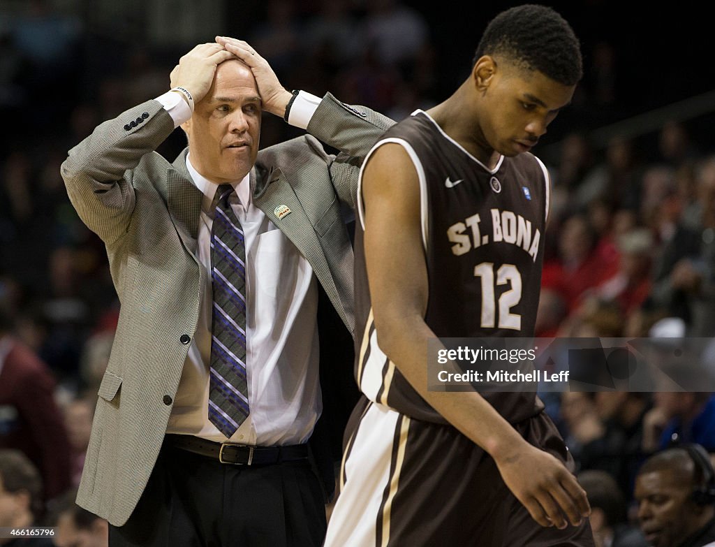 Head coach Mark Schmidt and Denzel Gregg of the Bonaventure