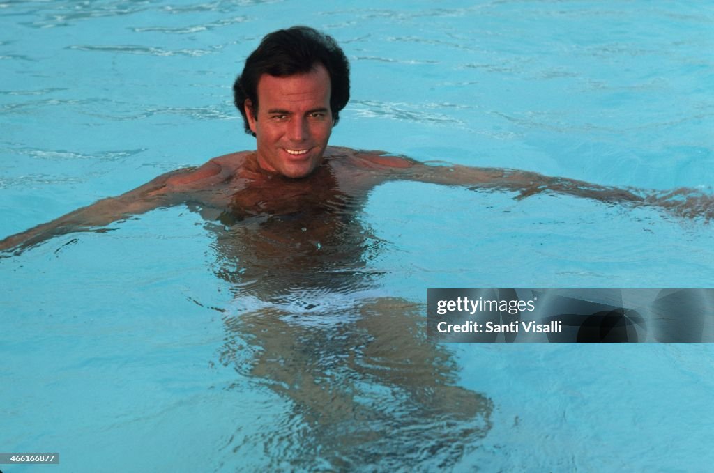 Singer Julio Iglesias In The Pool