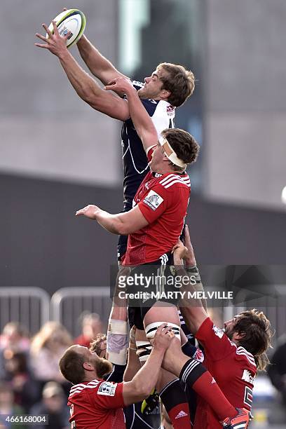 Lions' Andries Ferreira takes a line out ball with Crusaders' Scott Barrett during the Super 15 Rugby Union match between the Crusaders against RSA...