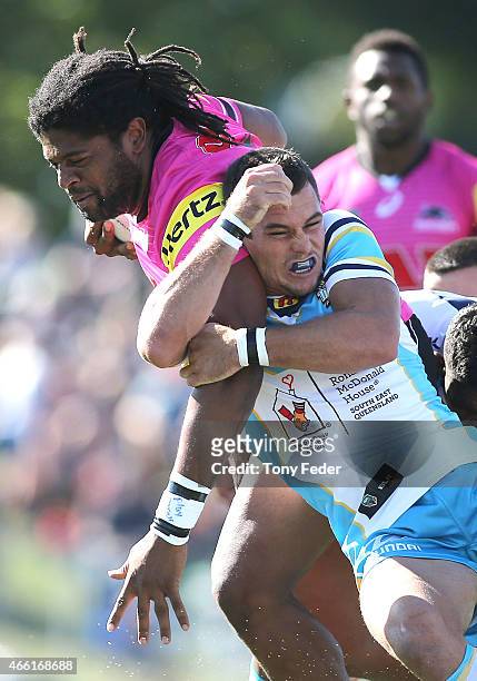 Jamal Idris of the Panthers is tackled by the Titans defence during the round two NRL match between the Penrith Panthers and the Gold Coast Titans at...