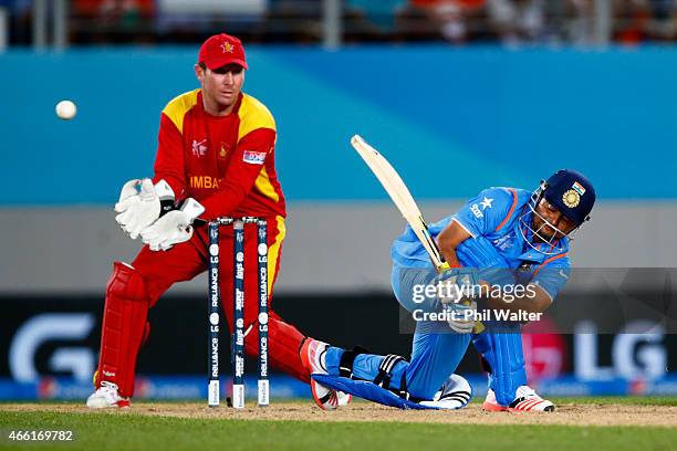 Suresh Raina of India bats during the 2015 ICC Cricket World Cup match between India and Zimbabwe at Eden Park on March 14, 2015 in Auckland, New...