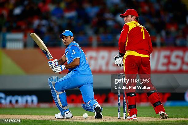 Dhoni of India bats during the 2015 ICC Cricket World Cup match between India and Zimbabwe at Eden Park on March 14, 2015 in Auckland, New Zealand.