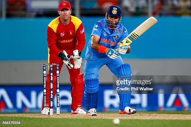 Suresh Raina of India bats during the 2015 ICC Cricket World Cup match between India and Zimbabwe at Eden Park on March 14, 2015 in Auckland, New...