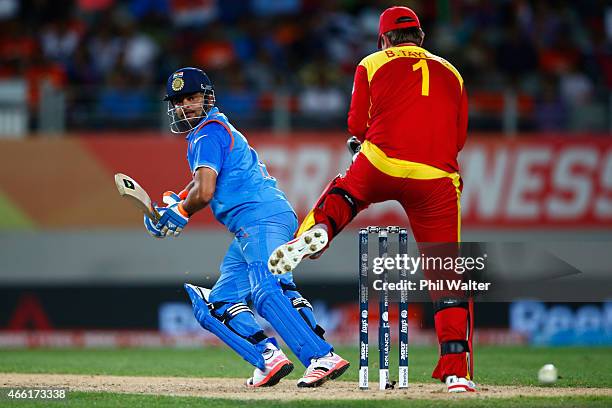 Suresh Raina of India bats during the 2015 ICC Cricket World Cup match between India and Zimbabwe at Eden Park on March 14, 2015 in Auckland, New...