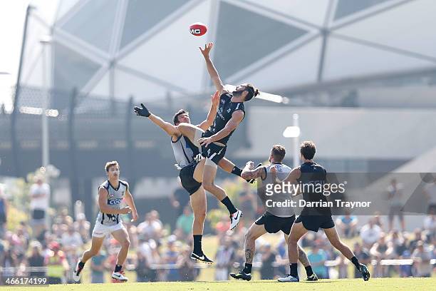 Quinten Lynch and Brodie Grundy battle in the ruck during a Collingwood Magpies AFL pre-season intra-club match at Olympic Park on February 1, 2014...