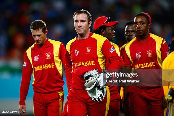 Brendan Taylor of Zimbabwe leads the team off the field at the end of the game during the 2015 ICC Cricket World Cup match between India and Zimbabwe...