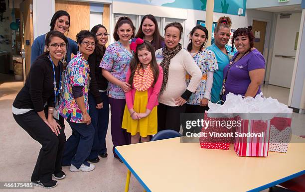 Actress Addison Riecke visits and brings gifts to patients at the Pediatric Rehabilitative Medicine Unit at Children's Hospital Los Angeles on...