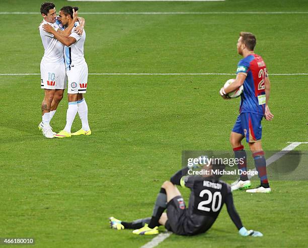 David Williams of Melbourne City celebrates a goal with Robert Koren as keeper Ben Kennedy of the Jets reacts during the round 21 A-League match...