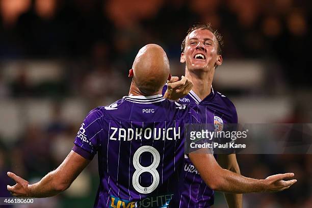 Ruben Zadkovich of the Glory is congratulated by Michael Thwaite after scoring an equalising goal during the round 21 A-League match between the...