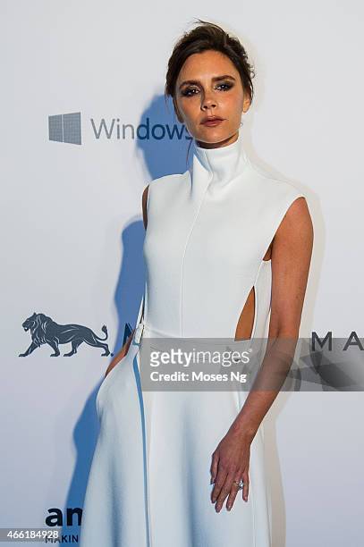Fashion Designer and Singer Victoria Beckham arrives on the red carpet during the 2015 amfAR Hong Kong gala at Shaw Studios on March 14, 2015 in Hong...