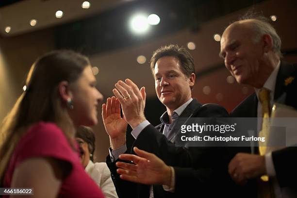 Deputy Prime Minister Nick Clegg and Business Secretary Vince Cable applaud Jo Swinson MP, Under Secretary of State for Women and Equalities after...