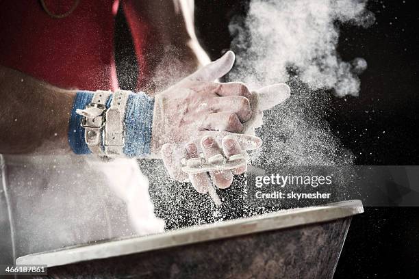 preparation for gymnastic bars. - hand clapping stock pictures, royalty-free photos & images