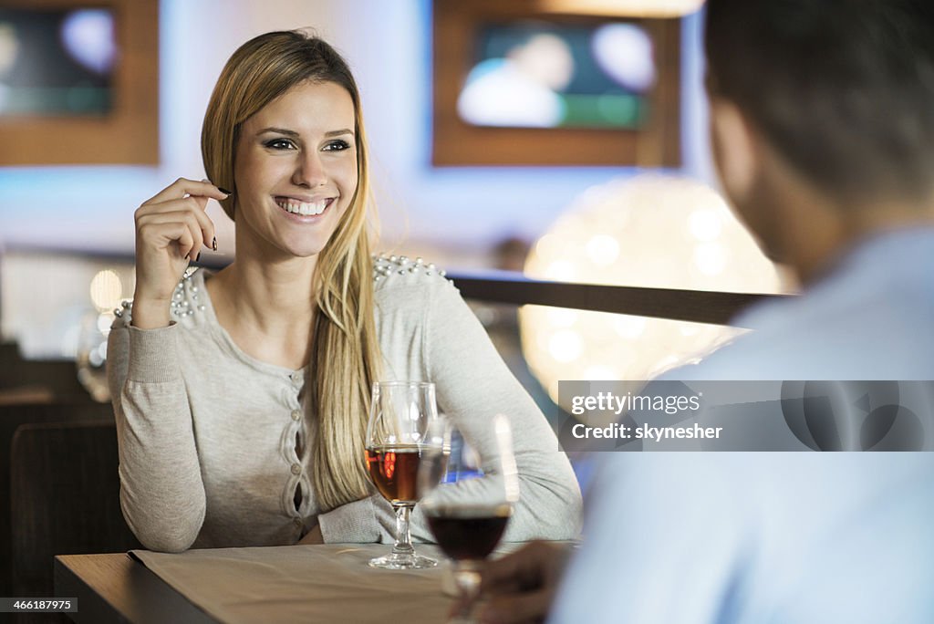 Couple having a drink.