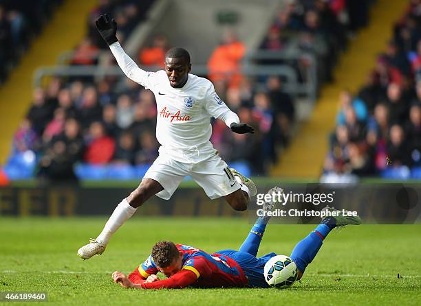Shaun Wright-Phillips of QPR goes past Dwight Gayle of Crystal Palace during the Barclays Premier League match between Crystal Palace and Queens Park...