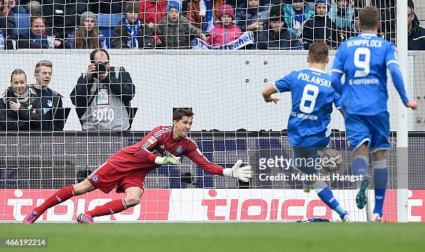 Eugen Polanski of Hoffenheim scores his team's first goal by a penalty kick past goalkeeper Rene Adler of Hamburg during the Bundesliga match between...