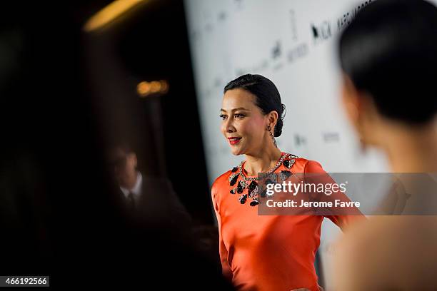 Actress Carina Lau arrives on the red carpet during the 2015 amfAR Hong Kong gala at Shaw Studios on March 14, 2015 in Hong Kong.