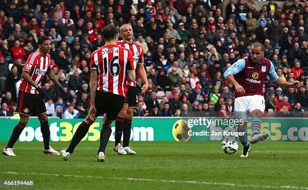 Gabriel Agbonlahor of Aston Villa scores their third goal during the Barclays Premier League match between Sunderland and Aston Villa at Stadium of...