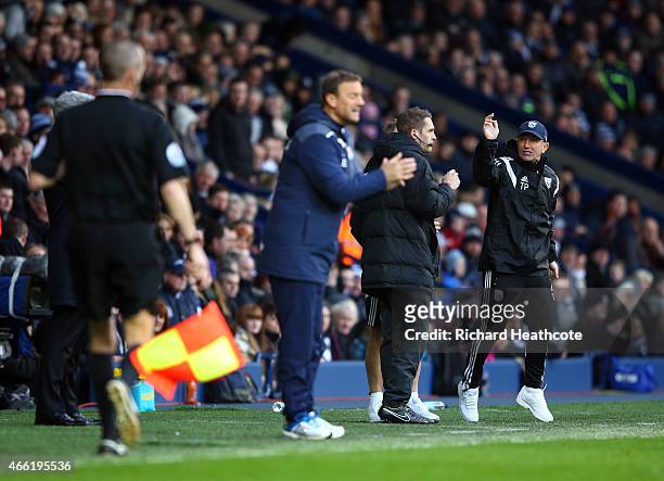 Tony Pulis, manager of West Brom shows his frustrations with the fourth official after the second goal of Brown Ideye of West Brom is disallowed...