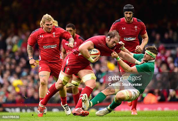 Ireland player Jamie Heaslip gets to grips with Alun Wyn Jones of Wales during the RBS Six Nations match between Wales and Ireland at Millennium...