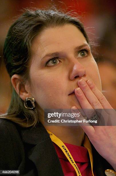 Jo Swinson MP, Under Secretary of State for Women and Equalities listens to business secretary Vince Cable delivering his keynote speech during the...