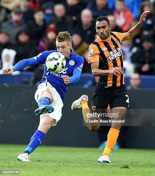 Jamie Vardy of Leicester City is challenged by Ahmed Elmohamady of Hull City during the Barclays Premier League match between Leicester City and Hull...