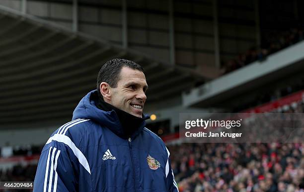 Manager Gustavo Poyet of Sunderland looks on during the Barclays Premier League match between Sunderland and Aston Villa at Stadium of Light on March...