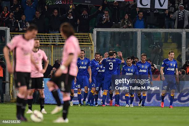 Alvaro Morata of Juventus celebrates with team mates after scoring the opening goal during the Serie A match between US Citta di Palermo and Juventus...