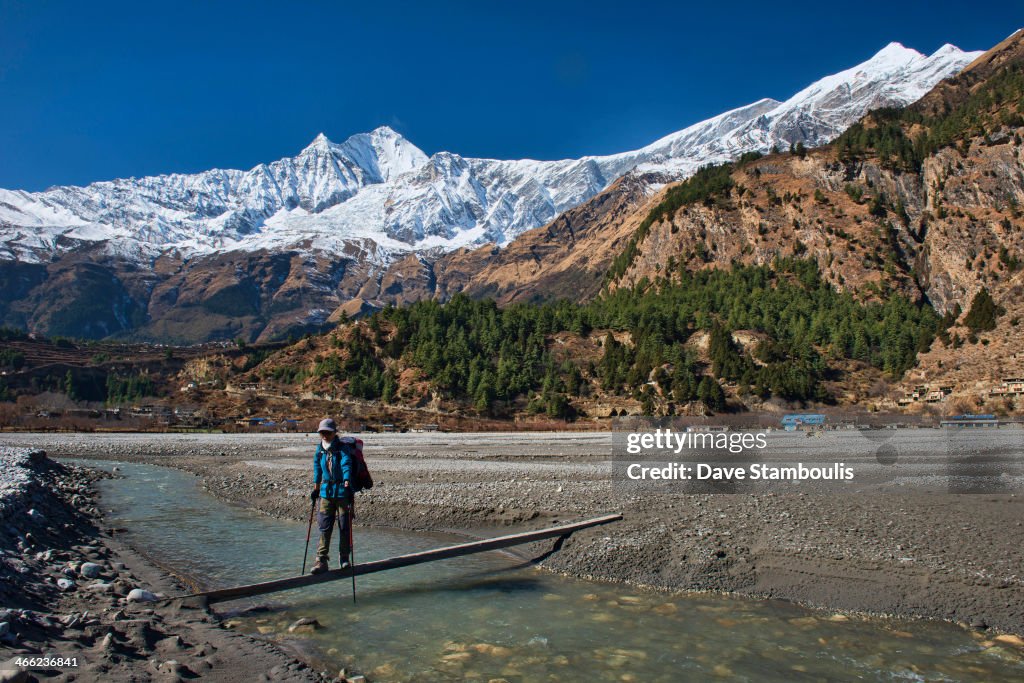 Raquel trekking along the Kali Gandaki River under