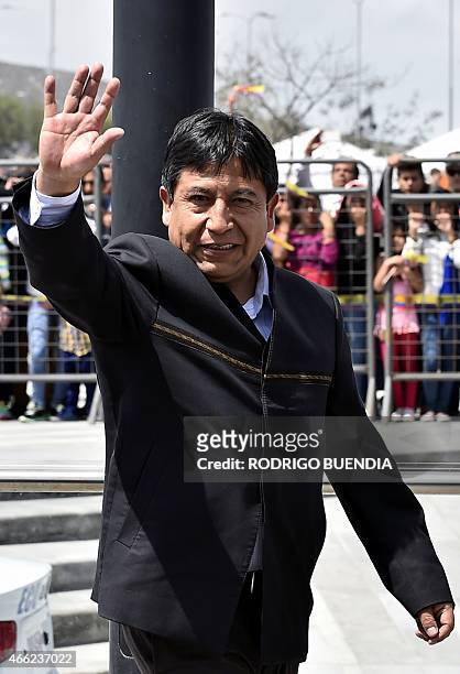 Bolivia's Foreign Minister David Choquehuanca waves upon arrival to take part in the UNASUR meeting in Quito, on March 14, 2015. Ecuador called for...
