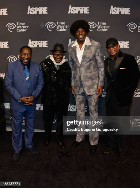 Magic Johnson, Eddie Levert, Walter Williams and Eric Grant of the O'Jays attend Time Warner Cable Studios And Aspire Bring Soul To The Big Game on...