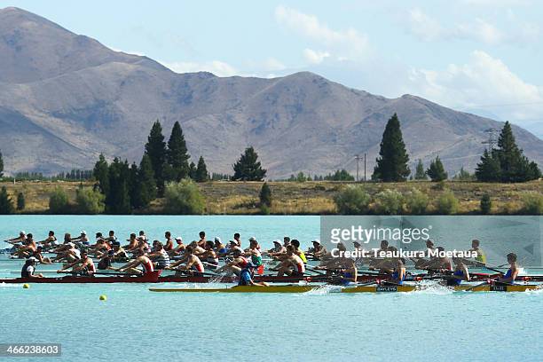 Rowers compete in the Mens open coxed eight during the South Island Club Championships at Lake Ruataniwha on February 1, 2014 in Twizel, New Zealand.