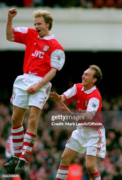May 1996 - Premiership - Arsenal v Bolton Wanderers - Dennis Bergkamp of Arsenal celebrates his goal with teammate David Platt.