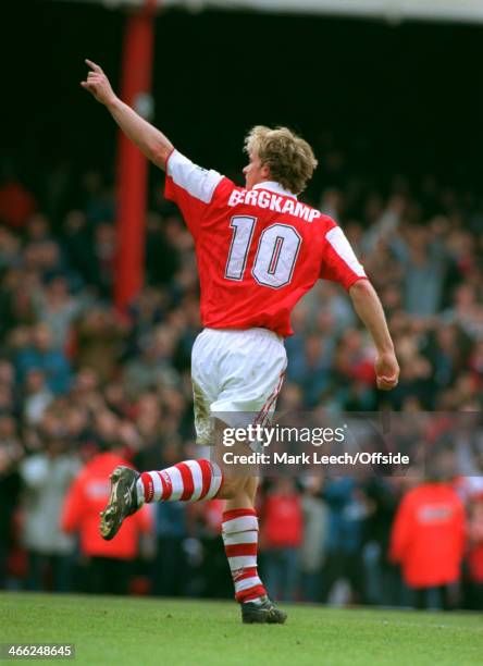 May 1996 - Premiership - Arsenal v Bolton Wanderers - Dennis Bergkamp of Arsenal celebrates his goal and points to the crowd.