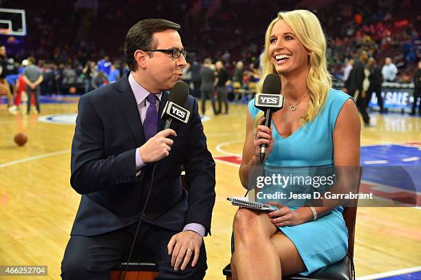 Yes Network reporters Ian Eagle ; Sarah Kustok talk things over prior to the Philadelphia 76ers against the Brooklyn Nets Game , this will be Sarah...
