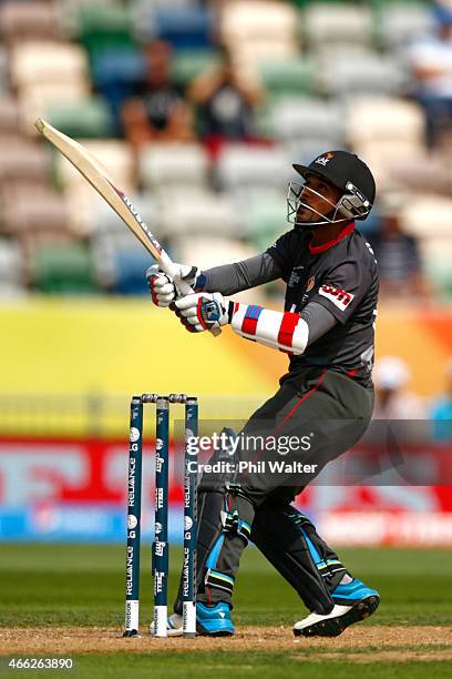 Nasir Aziz of the United Arab Emirates bats during the 2015 ICC Cricket World Cup match between the West Indies and United Arab Emirates at McLean...