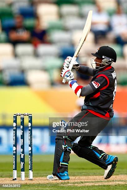 Nasir Aziz of the United Arab Emirates bats during the 2015 ICC Cricket World Cup match between the West Indies and United Arab Emirates at McLean...