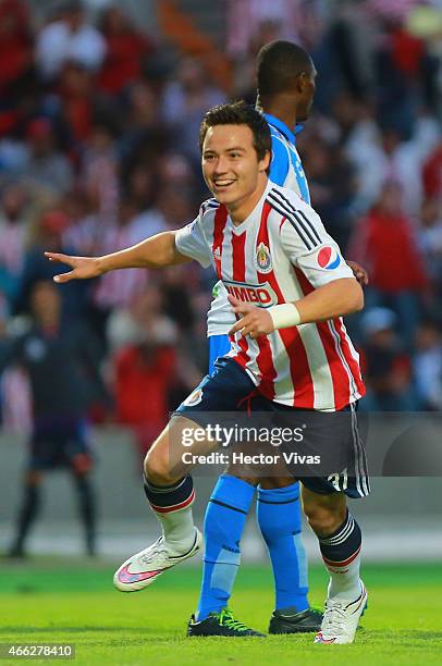 Erick Torres of Chivas celebrates after scoring the first goal of his team during a match between Puebla and Chivas as part of 10th round Clausura...