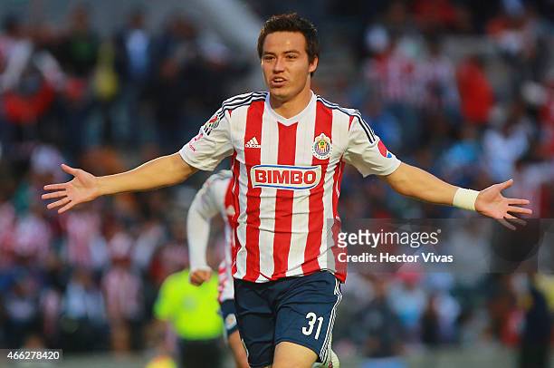 Erick Torres of Chivas celebrates after scoring the first goal of his team during a match between Puebla and Chivas as part of 10th round Clausura...