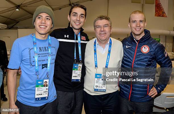 International Olympic Committee President Thomas Bach poses with short track speed skater J.R. Celski , short track speed skater Kyle Carr and speed...